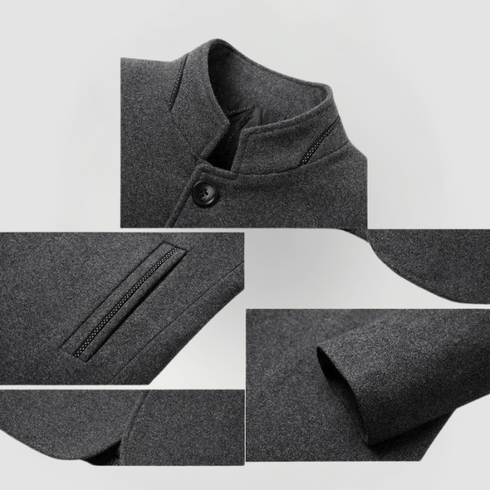 Detailansicht Herrenjacke aus dunkelgrauem Wollstoff, Stehkragen, Knopf, Reißverschlusstasche.