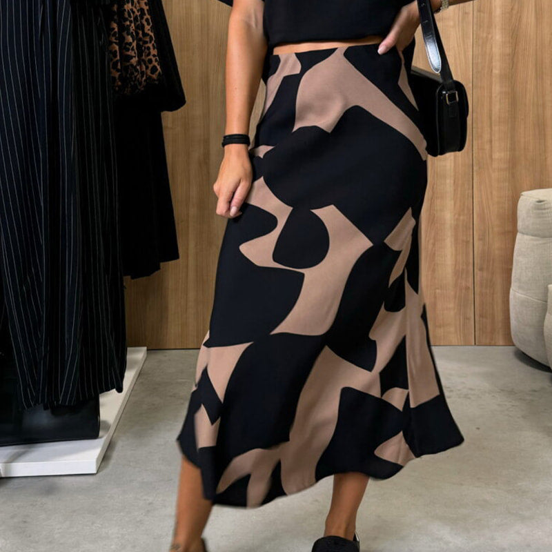 SIDONIE I MODISCHER ROCK MIT TIERMUSTER